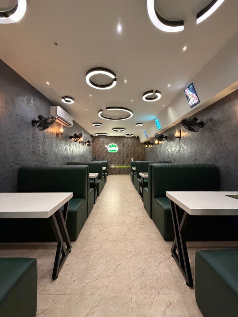 Cozy seating arrangement with modern lighting